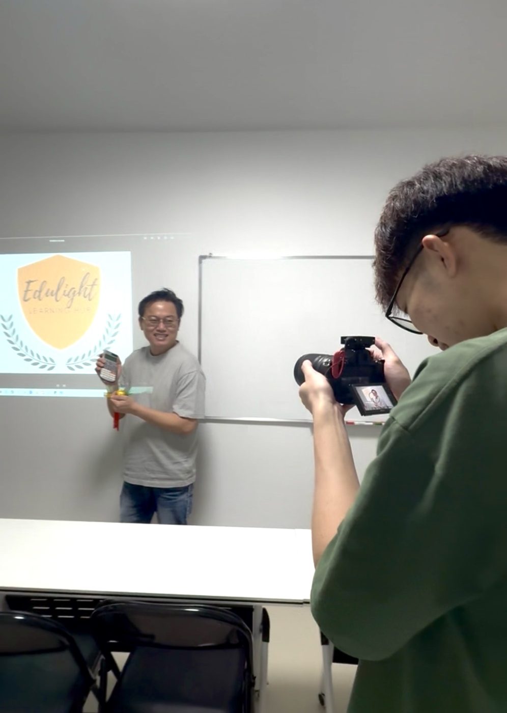 Podsee shooting a tutor at a centre